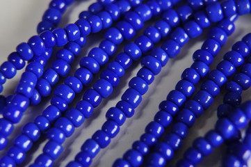 Obraz premium macro avec un collier bleu