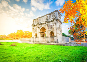 Fototapeta premium Arch of Constantine and Colosseum, antique Rome city, Italy at fall