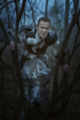 Terrible werewolf in the woods at night in the dark.
