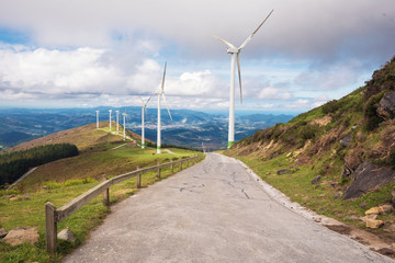 Renewable energy. Wind turbines, eolic park in scenic landscape of basque country, Spain.