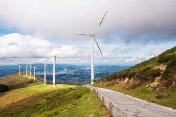 Renewable energy. Wind turbines, eolic park in scenic landscape of basque country, Spain.