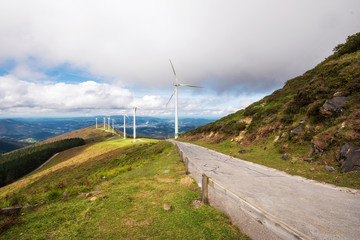 Renewable energy. Wind turbines, eolic park in scenic landscape of basque country, Spain.