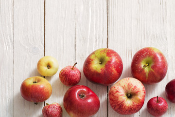 apples on wooden white background