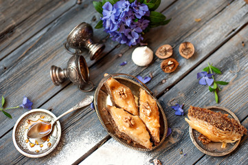 Pieces of tasty sweet pie on a metal dish