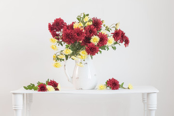 still life with chrysanthemums on white background