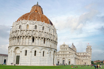 PISA, ITALY SEPTEMBER 2015: Pisa Baptistery, Cattedrale di Pisa and Torre di Pisa at Piazza del Duomo in Pisa, Italy.