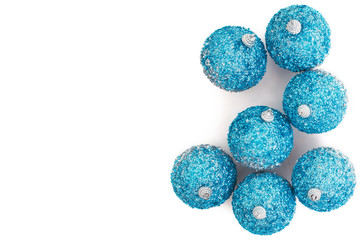  Christmas decor. Silver-blue balls of sequins on white background.Isolated