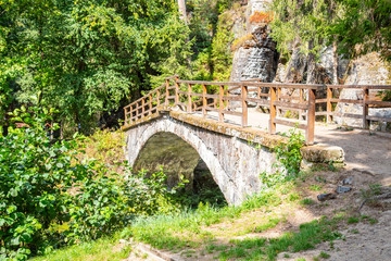 Bridge over river Kamenice in Bohemian Switzerland National Park, Czech Republic.