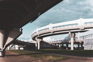 Underside of an elevated roads against the blue sky