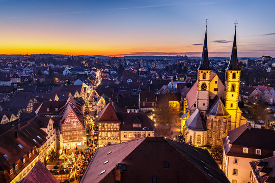 Panoramic view of Bad Wimpfen, Germany, with traditional christmas market and the city church during the blue hour. HDR taken from the blue tower (Blauer Turm).