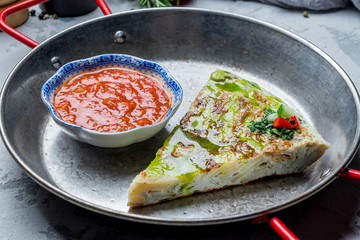 Spanish tortilla with sauce