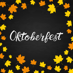 Lettering Oktoberfest written with brush on chalkboard background. Traditional German beer festival vector illustration. Autumn fall leaves.