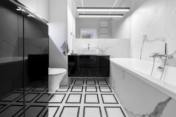 Fototapeta na wymiar Modern bathroom with marble finishing