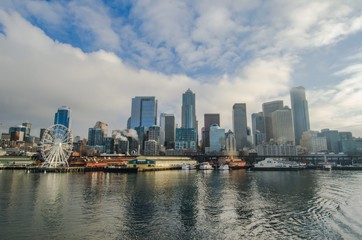 Downtown Seattle Views with reflection on puget sound taken from the Ferry
