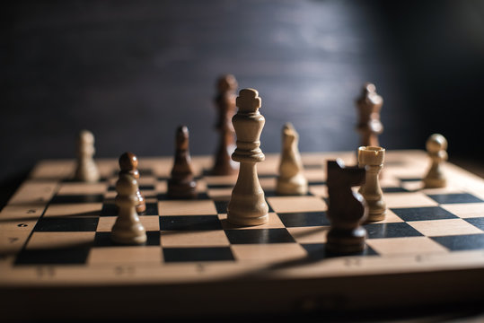 Chess on chessboard close up