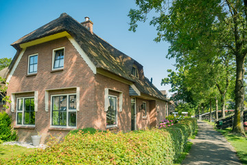 Fototapeta na wymiar Beautiful traditional house of Giethoorn