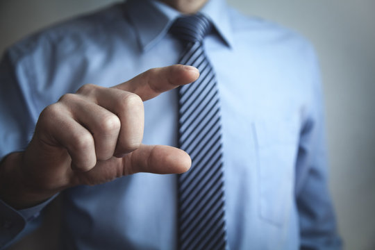 Businessman pointing fingers. Business concept