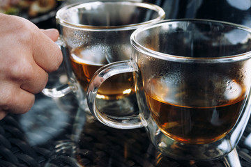 Tea ceremony.Cups of tea on the table