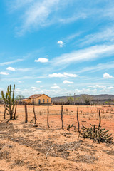 Cariri, Para&iacute;ba, Brazil - February, 2018: Landscape of a Simple life background with a beautiful house in a dry land