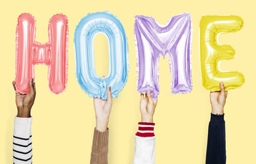 Hands showing balloons word