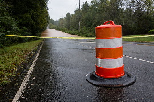 Waxhaw, North Carolina - September 16, 2018: Police barricade the road after a bridge is washed out by rain from Hurricane Florence