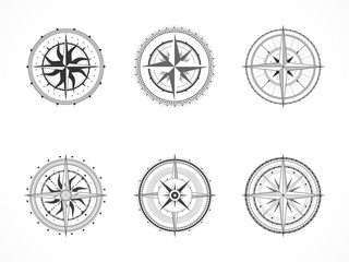 Vector set of vintage compasses or marine wind roses. Collection in line art style. Black line. Isolated on white background.