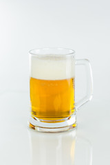 Beer with foam and bubbles