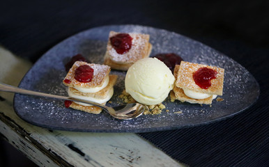 Photo of a macro delicious cake with cream