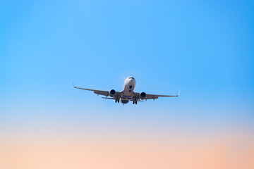 Airplane flying high departing from the airport