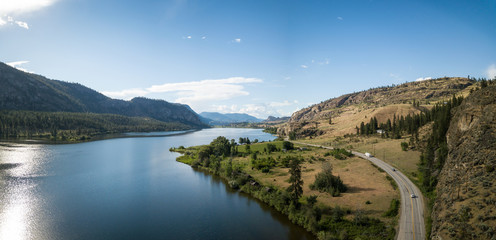 Aerial panoramic view of Okanagan Hwy near Vaseux Lake during a sunny summer day. Located between...