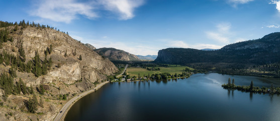 Aerial panoramic view of Okanagan Hwy near Vaseux Lake during a sunny summer day. Located between...