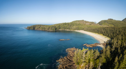 Beautiful aerial panoramic seascape view of Pacific Ocean Coast during a vibrant summer day. Taken at Grant Bay, Northern Vancouver Island, BC, Canada.