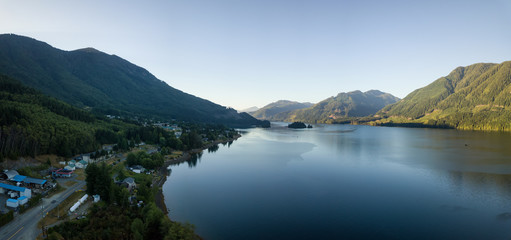 Aerial view of a small town, Port Alice, during a sunny summer sunrise. Located in Northern...
