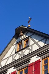 framework facade with window shutters