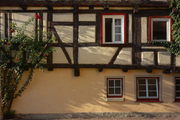 framework facade with window shutters