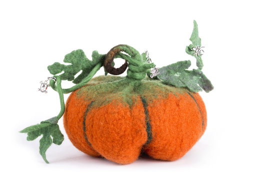 Pumpkin handmade from felted wool for celebration of Halloween