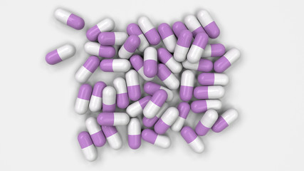 Obraz na płótnie Canvas Pile of white and purple medicine capsules