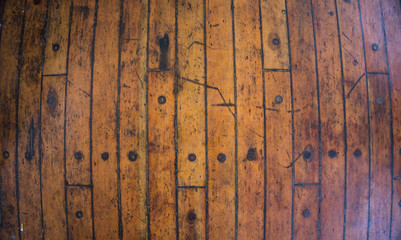 wooden texture background with brown yellow color as floor of the ship deck