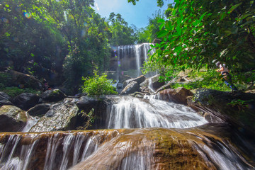 Beautiful waterfalls flow through the rocks in  forest at Soo Da Cave Roi et Thailand