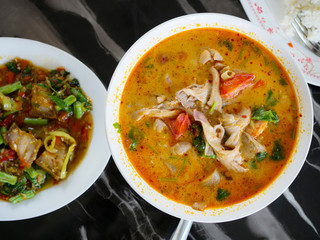 fresh seafood soup in bowl on table