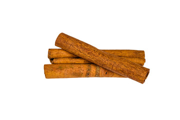 Brown cinnamon sticks isolated on a white background