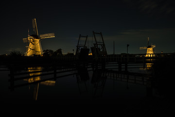 the windmills in Kinderdijk are illuminated