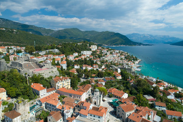 Fototapeta na wymiar Aerial view of Herceg Novi town, marina and Venetian Forte Mare, Boka Kotorska bay of Adriatic sea