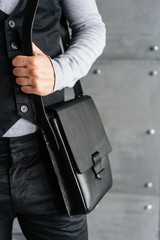 handsome guy with leather bag