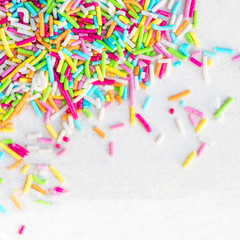 Sugar sprinkles on a white background as  decoration for cake and bakery. 