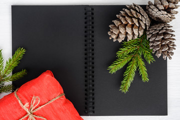 Christmas background. Top view of a notebook and New Year's decorations