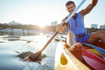 Young man kayaking