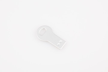 Flash drive silver key on the white background