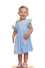 adorable little girl looks very happy