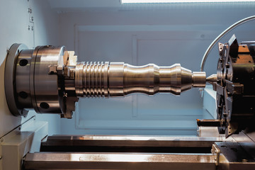 Machining of parts on a lathe.